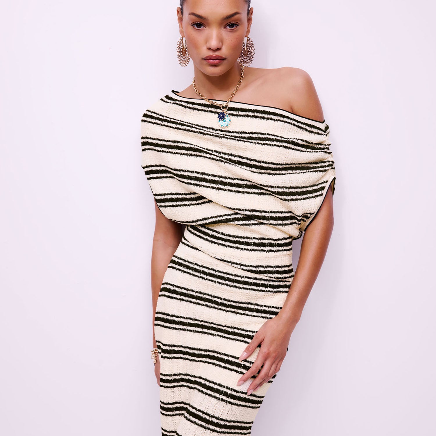 <u>SHOP DRESSES</u> <u>SHOP DRESSES</u>