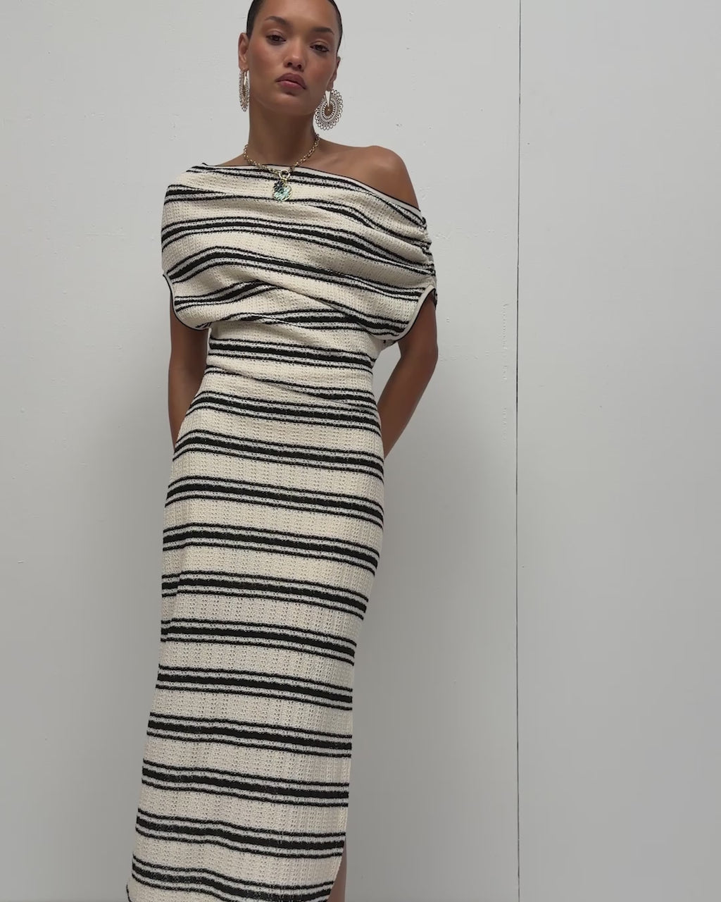 striped off the shoulder midi dress Chet Striped Knit Midi Dress in black stripe
