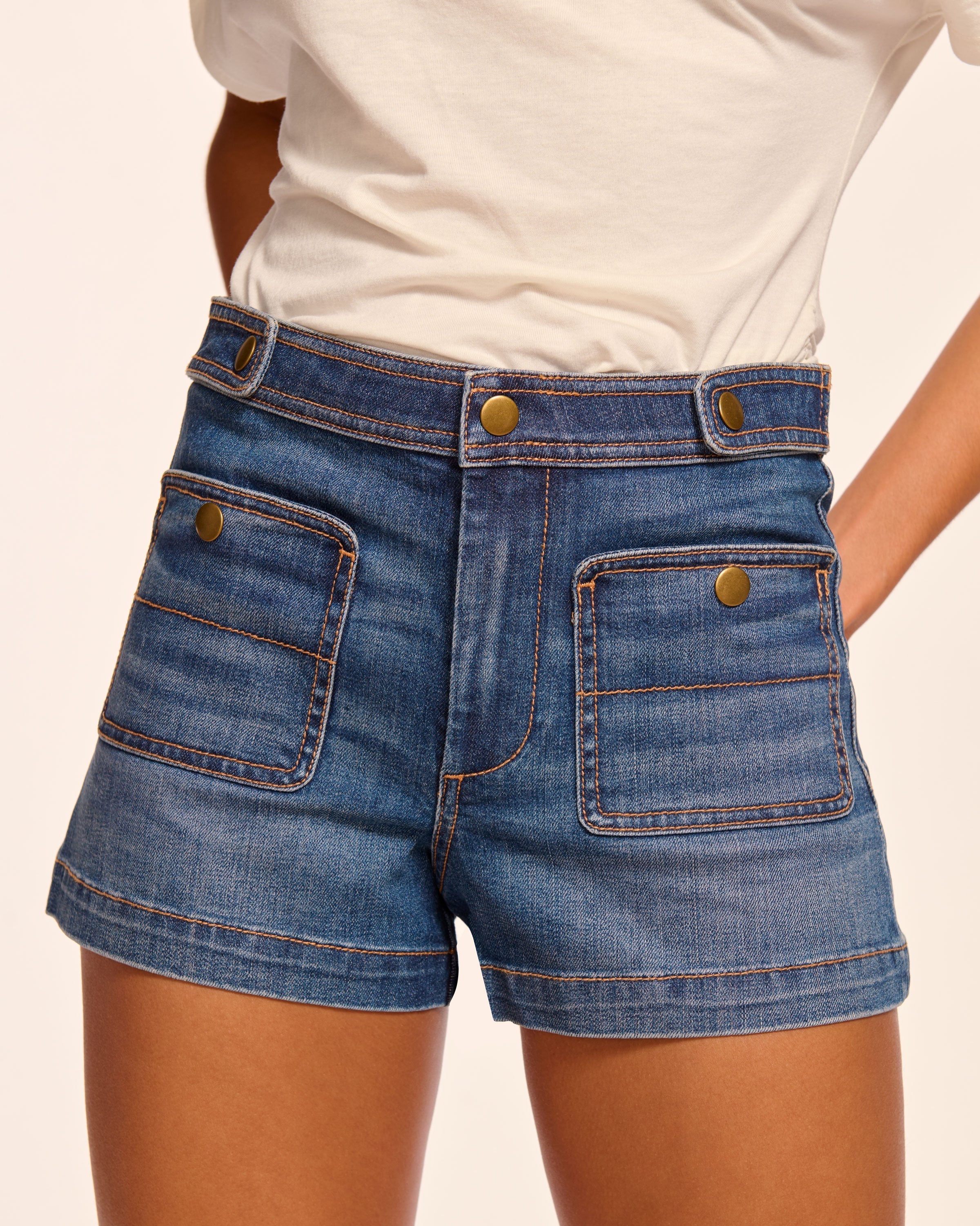 Gemma Mid-Rise Denim Mini Short in medium wash | Ramy Brook
